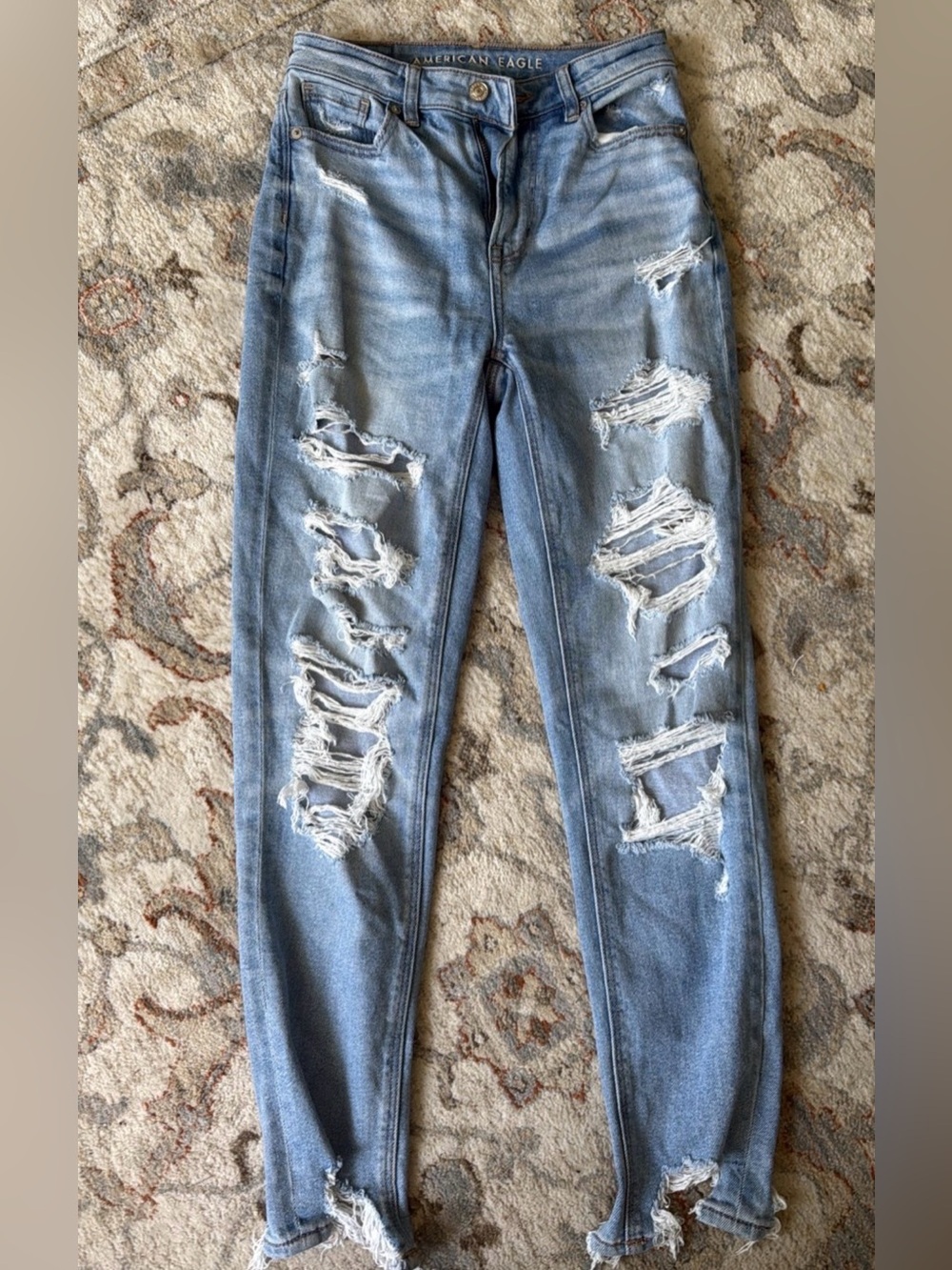 American Eagle Outfitters Women's Light Blue Ripped Skinny Jeans size 0